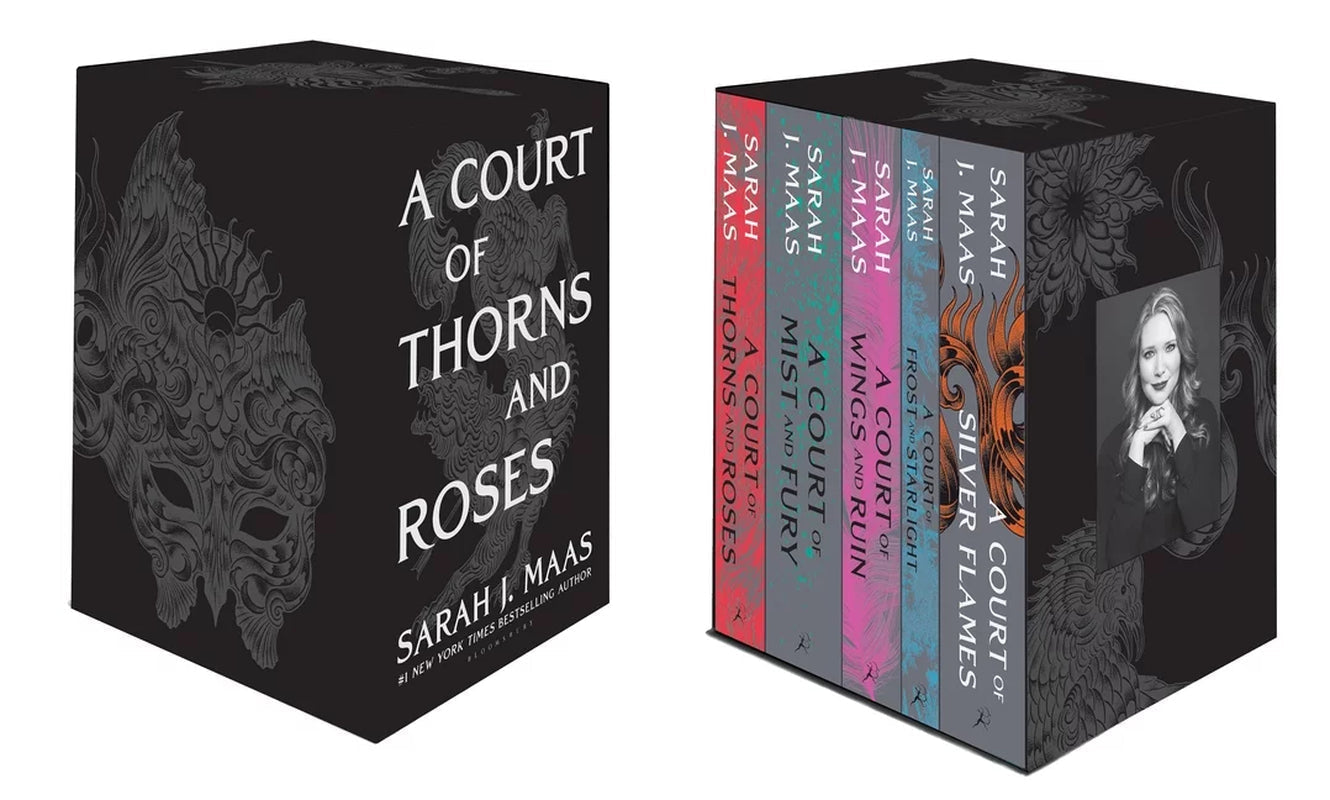 A five-book box set of 'A Court of Thorns and Roses' by Sarah J. Maas, featuring hardcover editions with black and floral design on the covers.