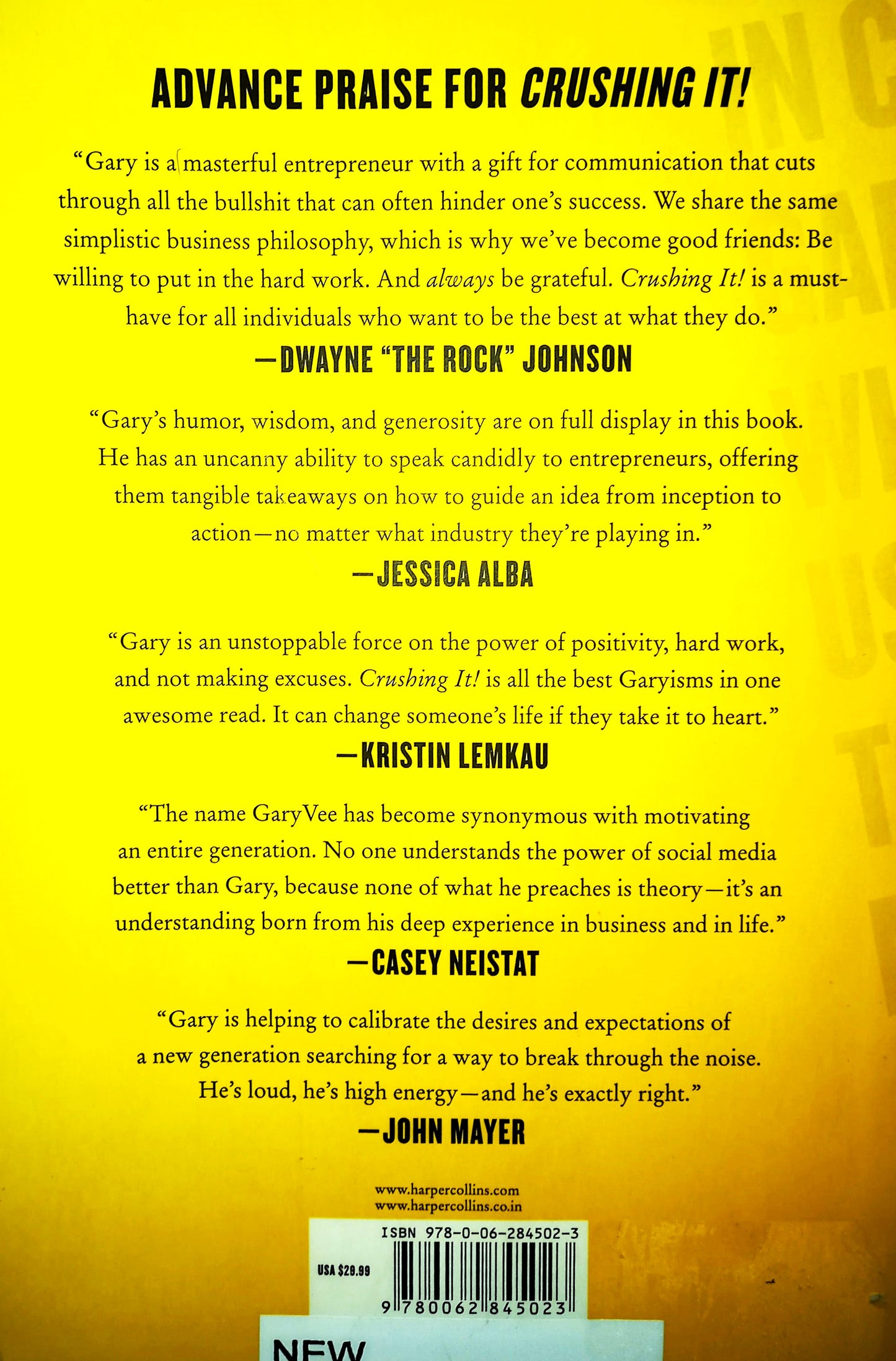 Book back cover of 'Crushing It' by Gary Vaynerchuk with a yellow background and a barcode with advanced praise for the author and his works on the topics of business and social media marketing.