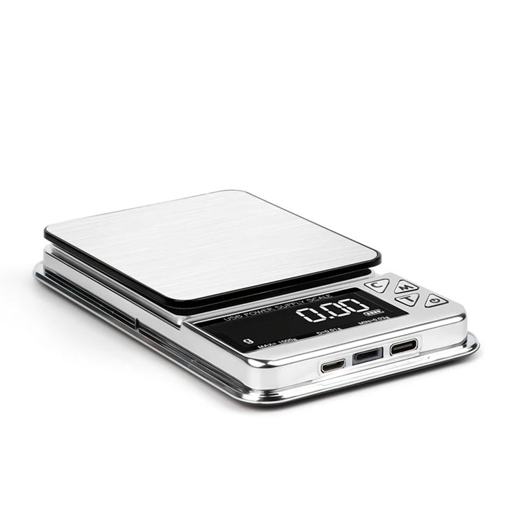 Digital scale with a clear lid over a white background