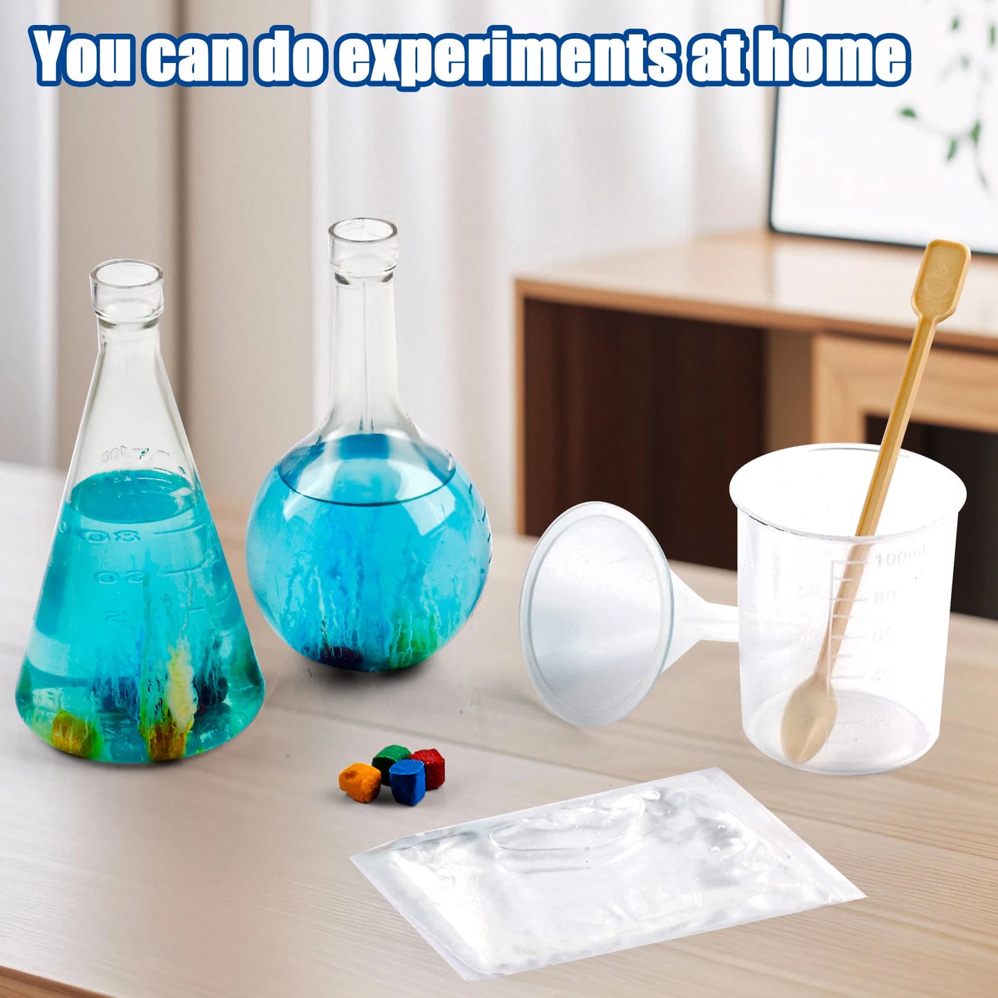 Science experiment setup with beakers, a cup, and colorful liquids on a table.
