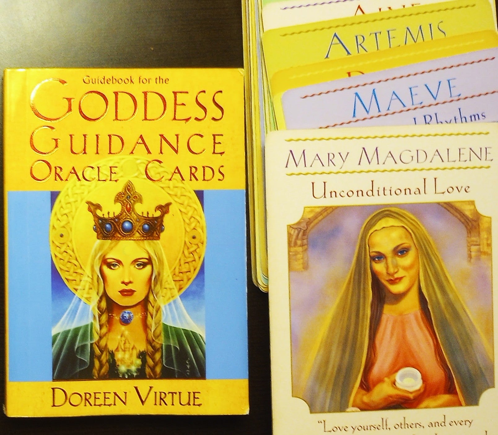 Goddess Guidance Oracle Cards with guidebook and card featuring Mary Magdalene.
