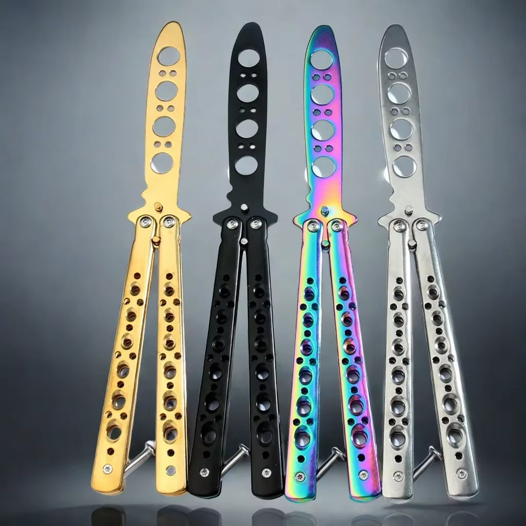 Four dull butterfly knife trainer options with a dull blades and multiple holes in the handle for grip or handling, featured side-by-side for display.