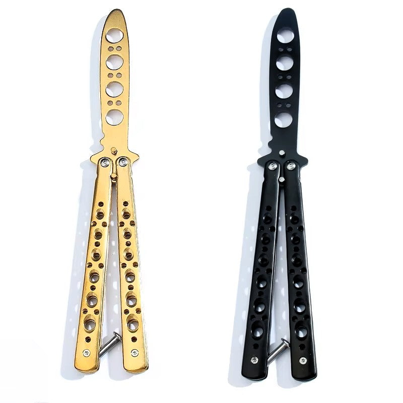 Two butterfly-style knives with perforated handles are shown side by side on a white background, one in metallic gold and one in black.