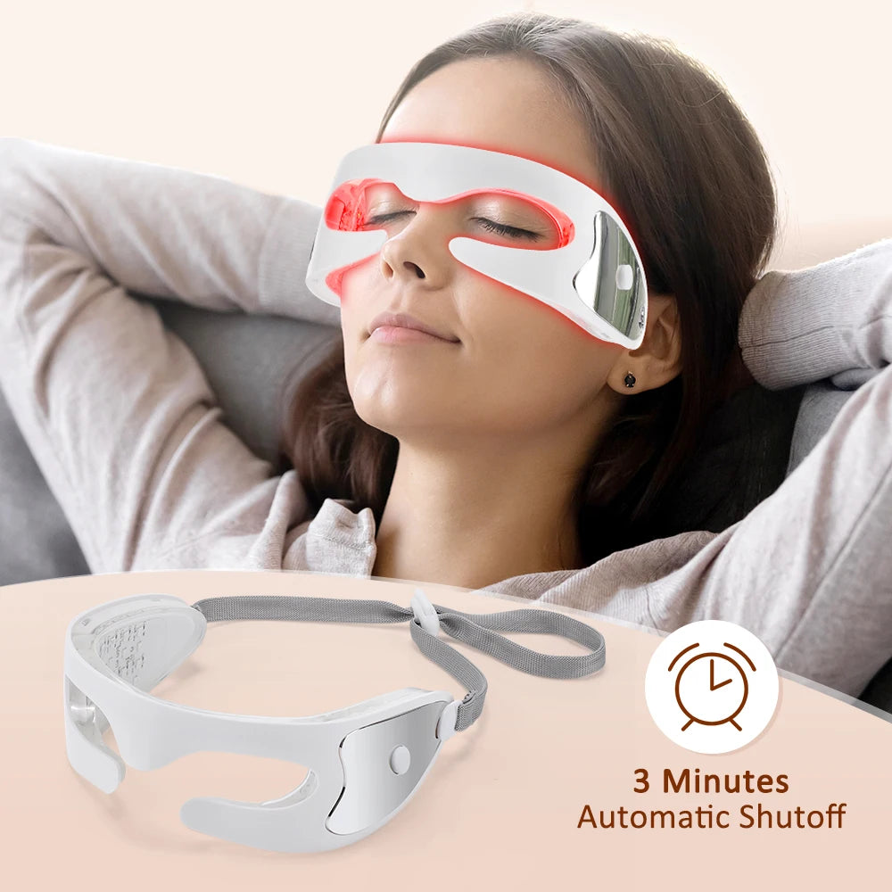 Woman wearing a red light eye mask while sleeping with another mask on display.