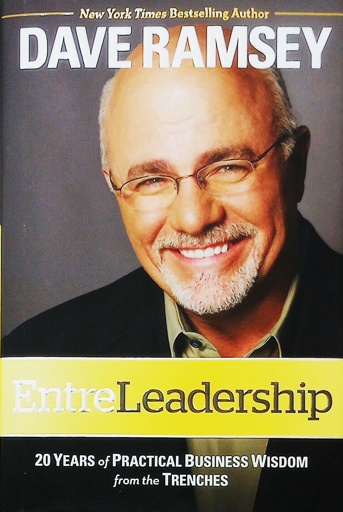 Book cover featuring Dave Ramsey with text about 'EntreLeadership' and his business wisdom.