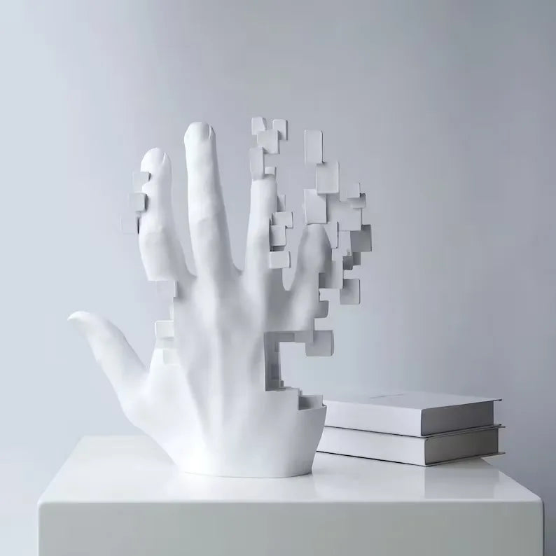 White abstract sculpture resembling a hand with geometric elements on a gray background