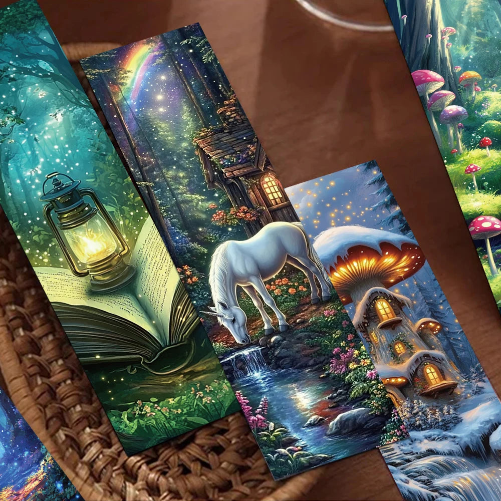 Fantasy-themed bookmarks with a white unicorn, mushroom house, and open book on a woven surface.