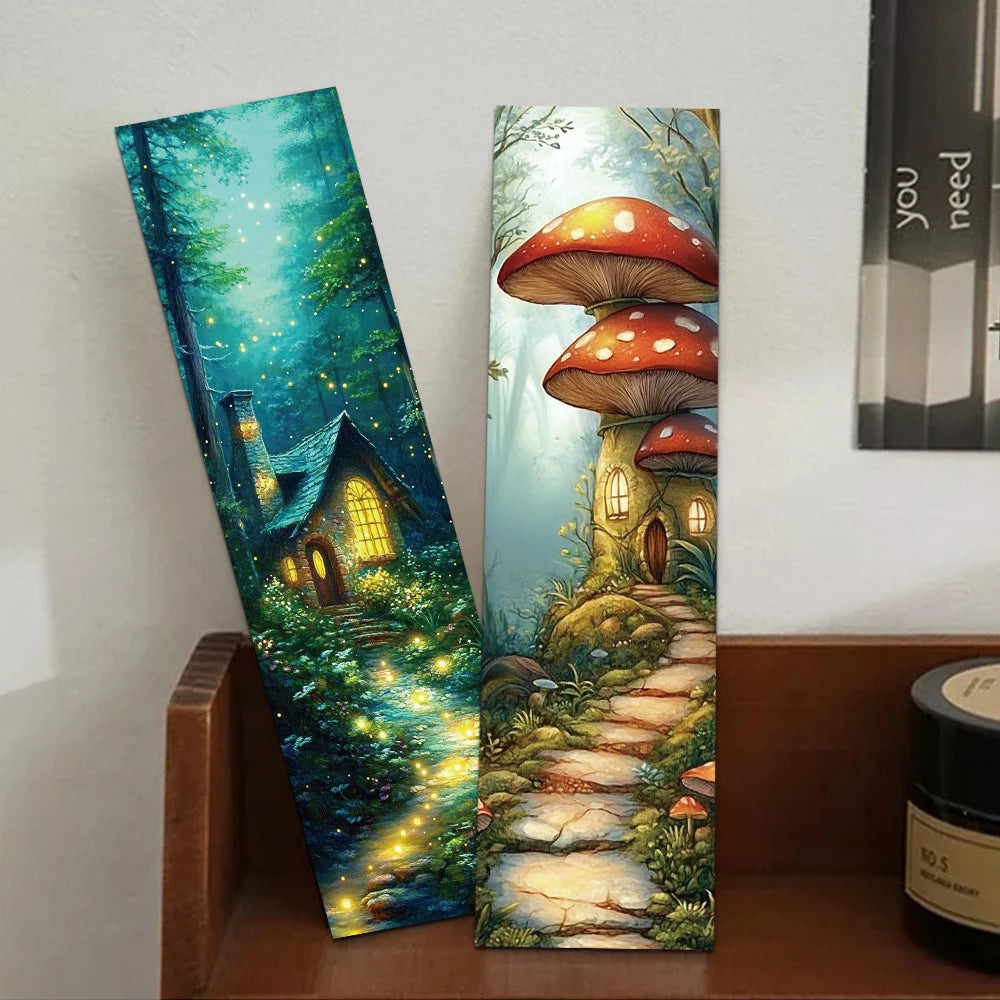 Two vertical bookmarks depicting a forest scene with a house and mushroom houses on a wooden surface.