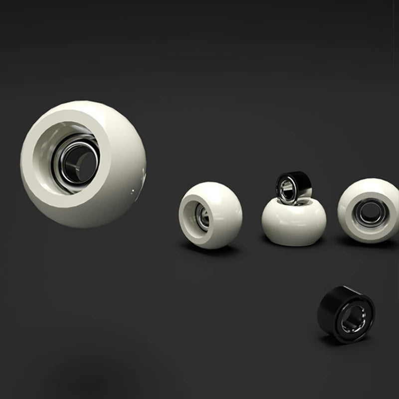 Set of mini-skateboard bearings on a dark background