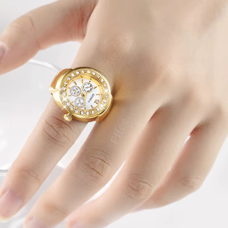 Close up of a mannequin hand wearing a finger ring watch.