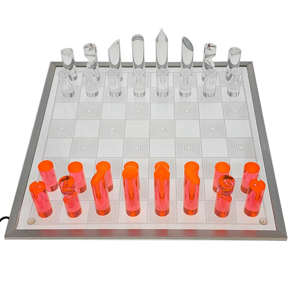 Close-up of the 3D translucent chess pieces catching the under-lighting of the board.