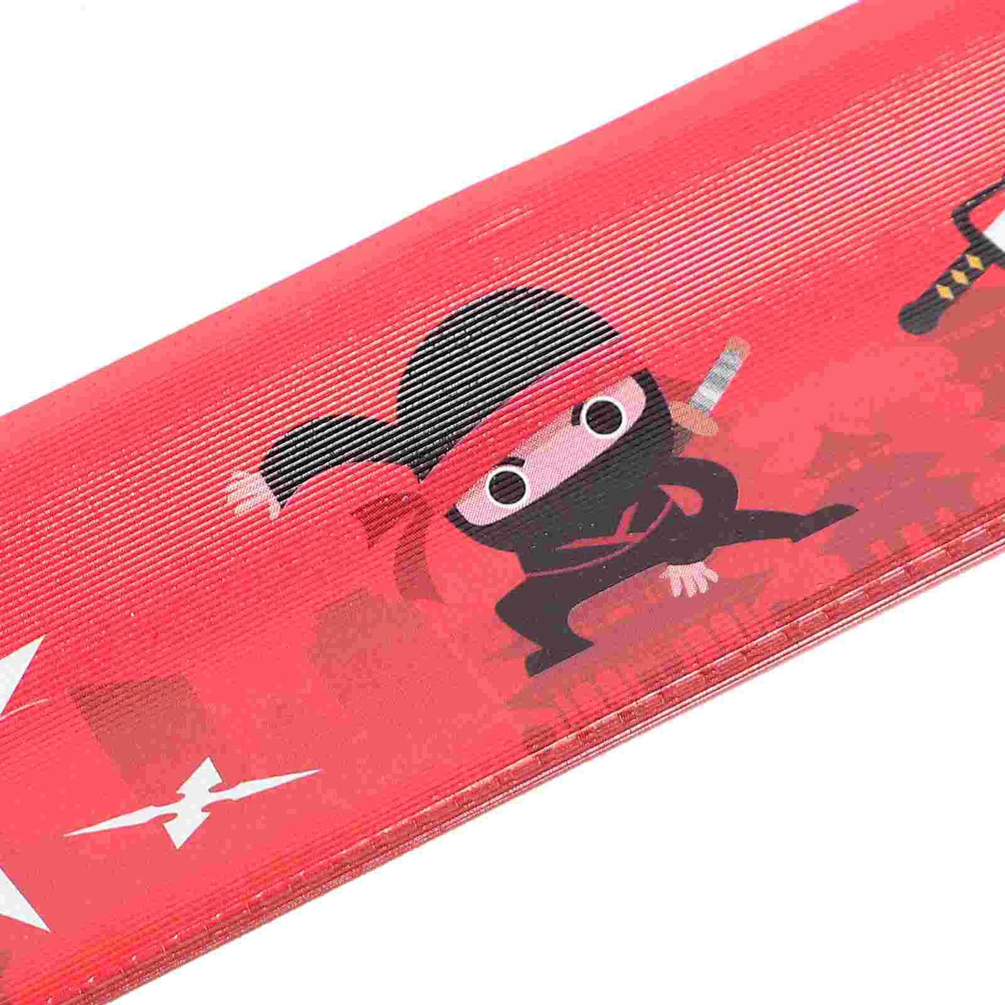 Red slap bracelet with cartoon ninja characters on a white background