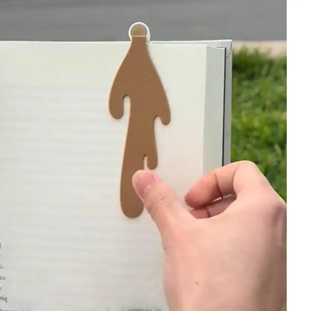 Bookmark with coffee spilling on page it's marking.