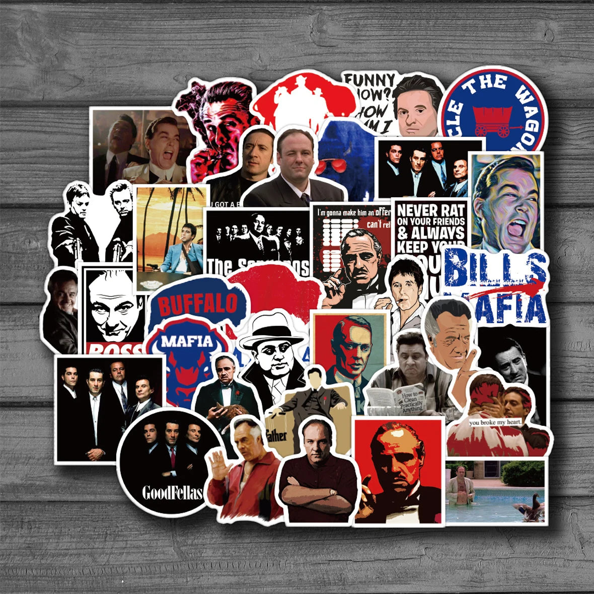 Collection of 'GoodFellas' themed stickers on a wooden surface