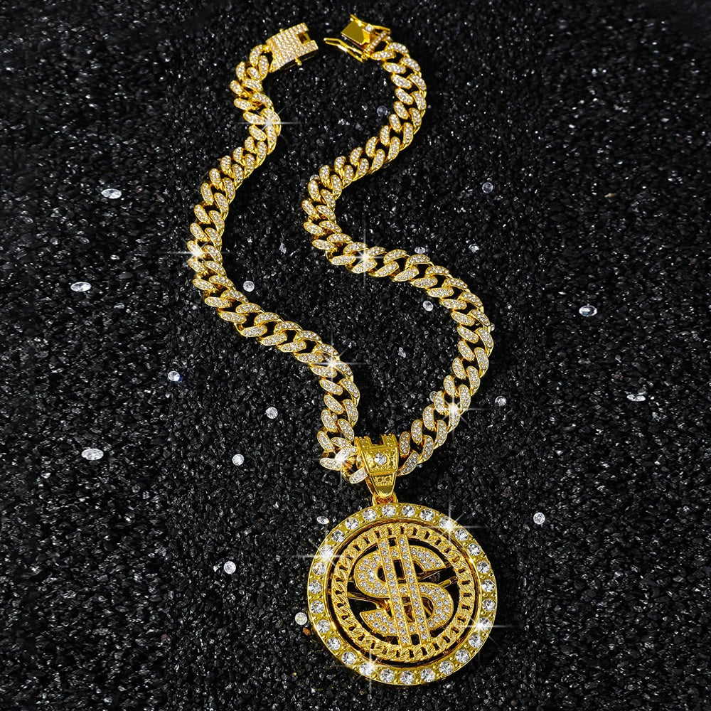 Gold chain necklace with dollar sign pendant on a black shining background.