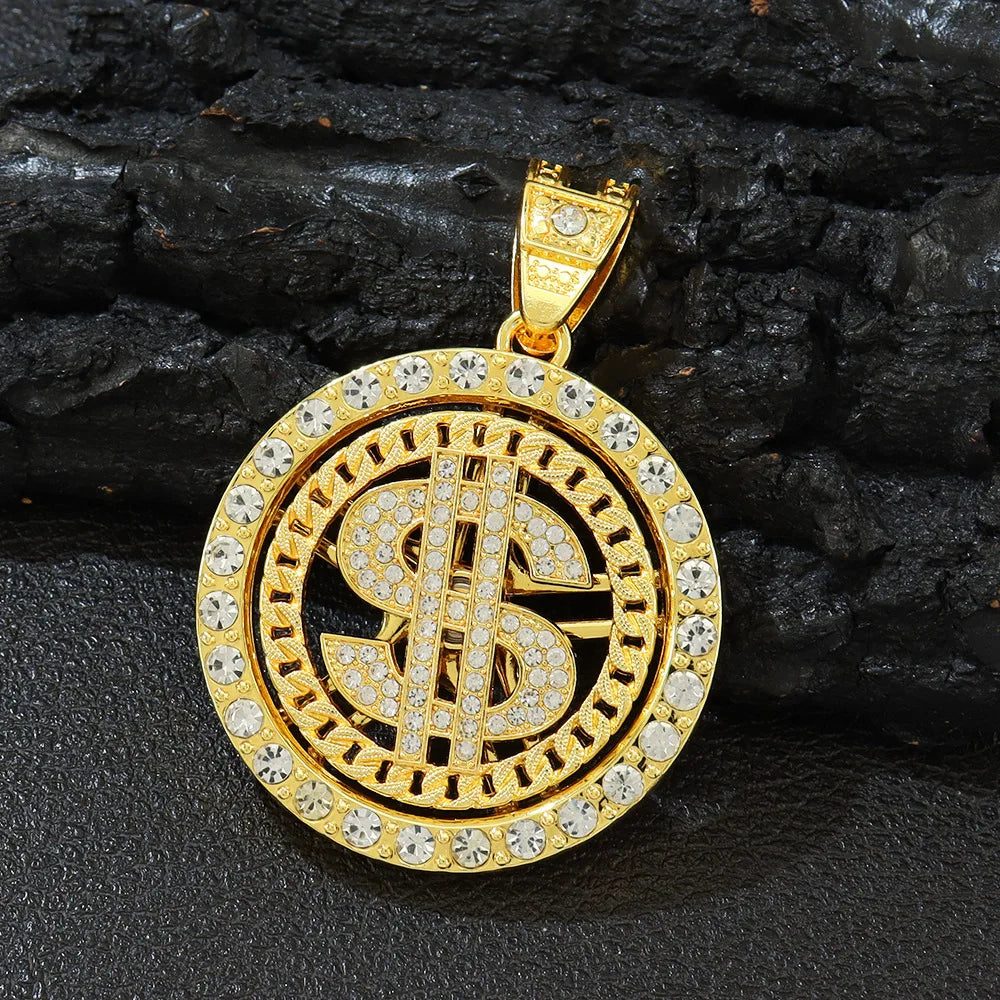 Gold pendant with spinner dollar sign design on a dark stone background