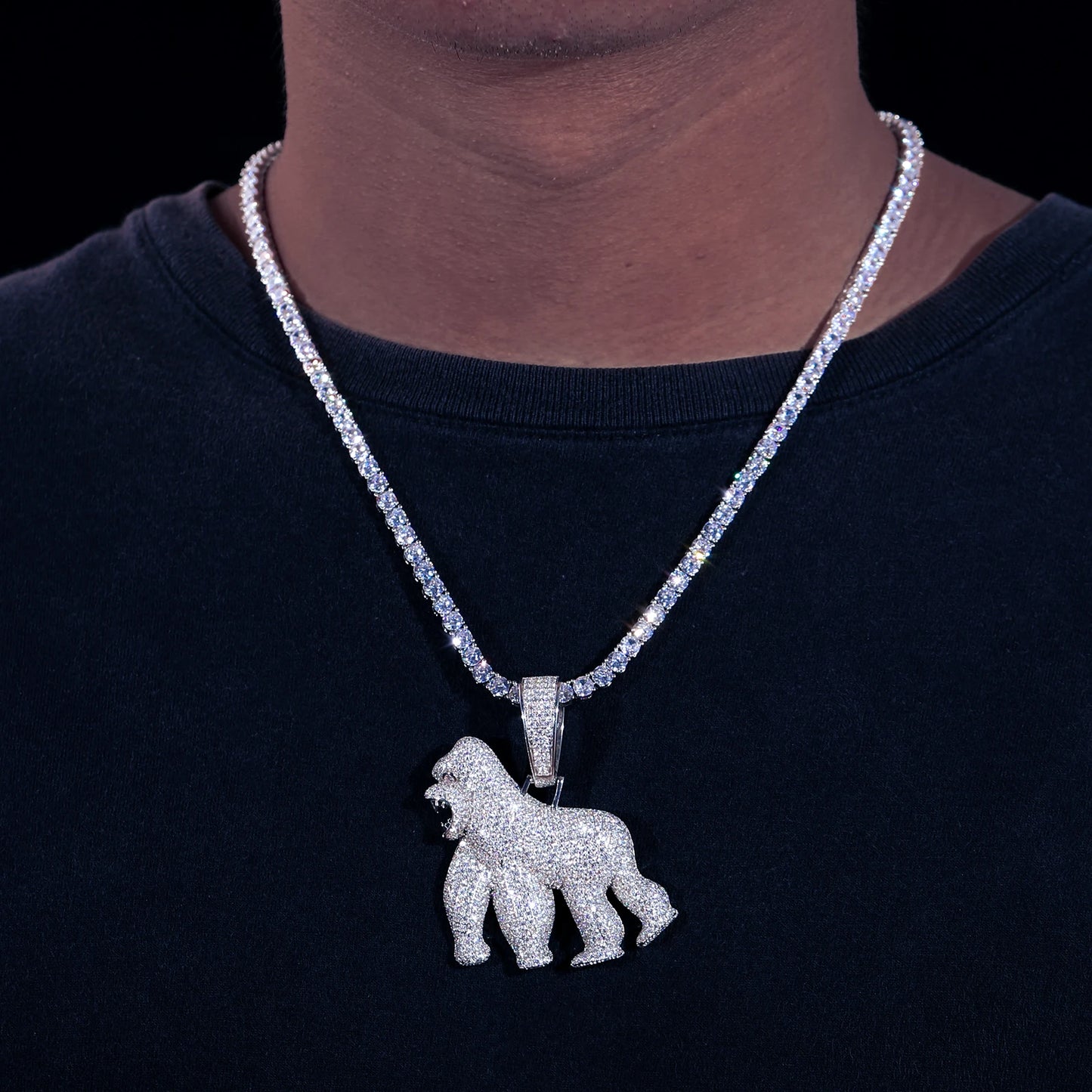 Necklace with a gorilla pendant on a black background