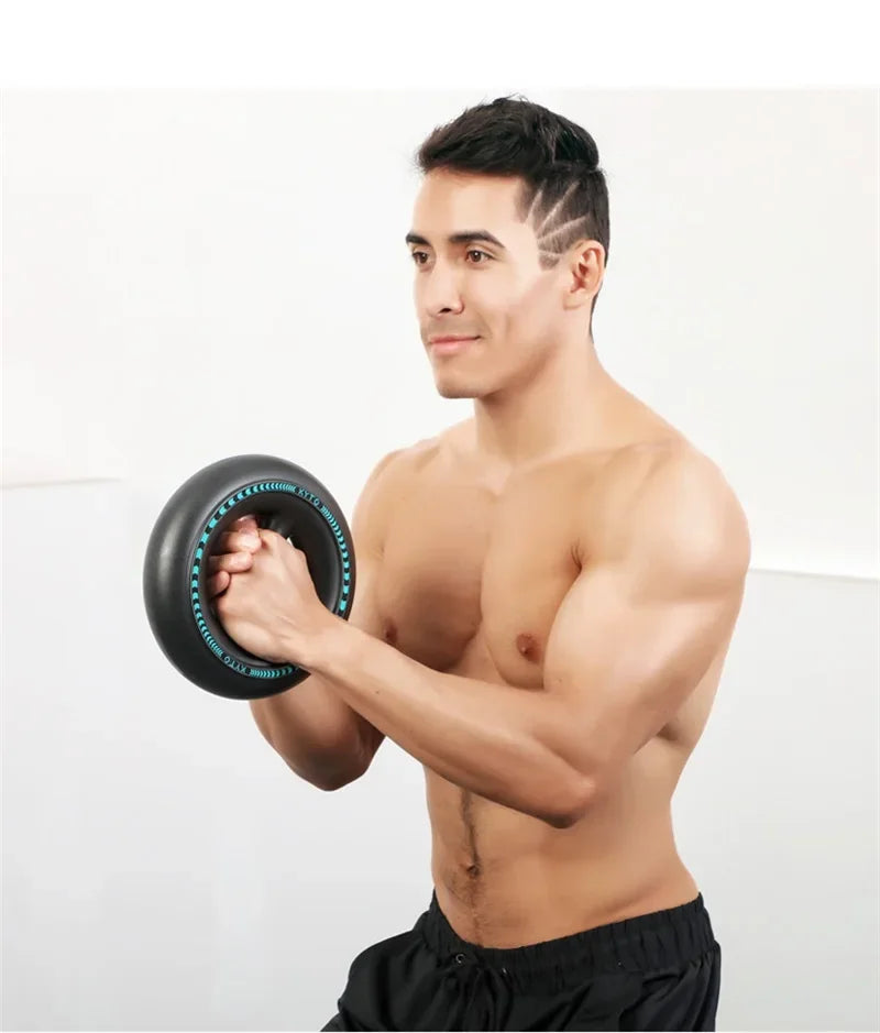 Athlete using the centrifugal powerball ring to workout biceps and wrists.