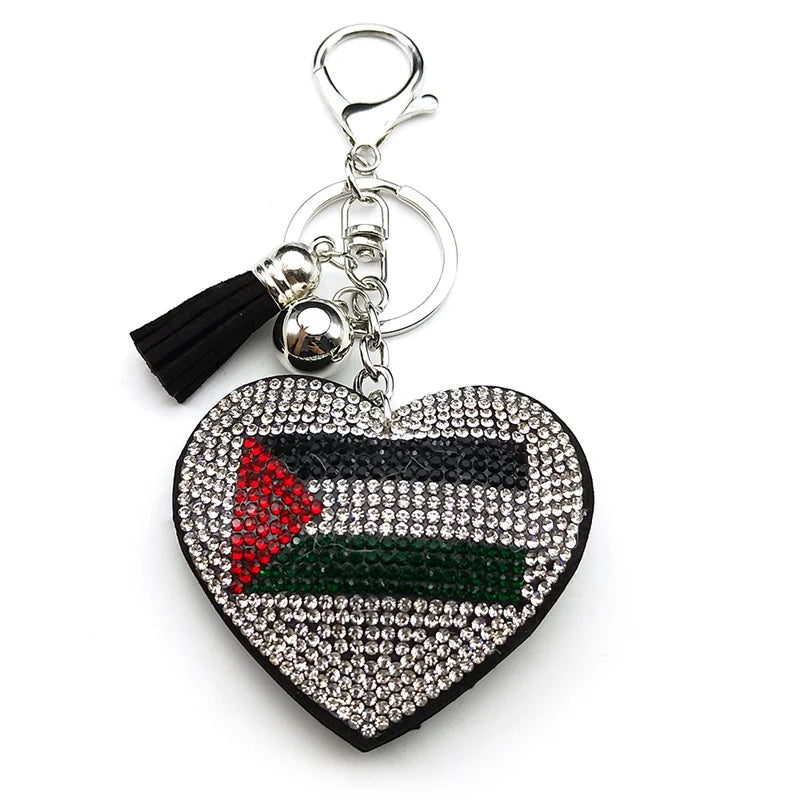 Heart-shaped keychain with Palestinian flag design on a white background