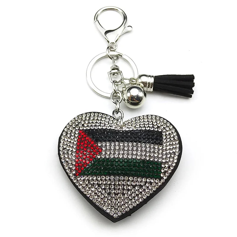 Heart-shaped keychain with Palestinian flag design on a white background