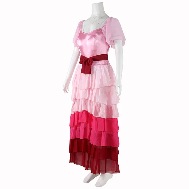 Mannequin wearing a pink and red dress with a gradient effect on a white background