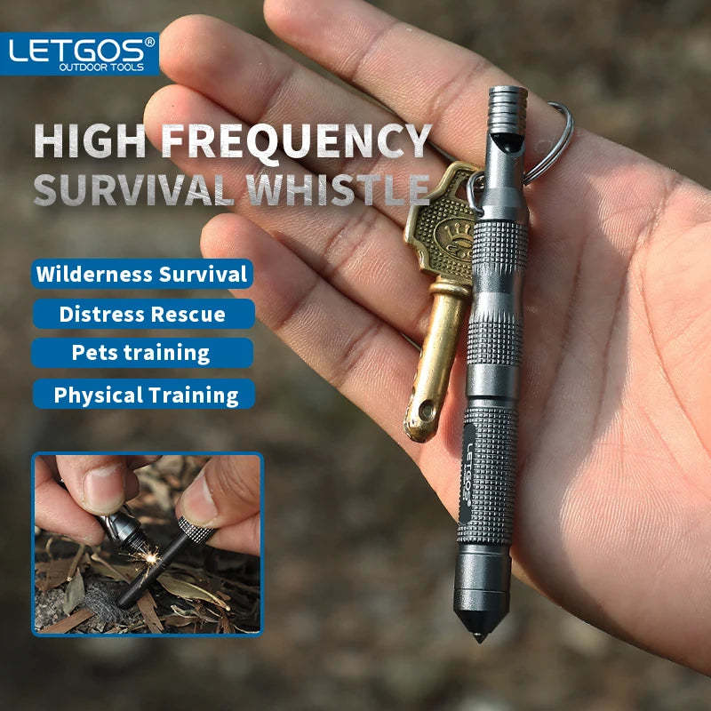 High frequency survival whistle held in a hand with LETGOS branding and usage information.