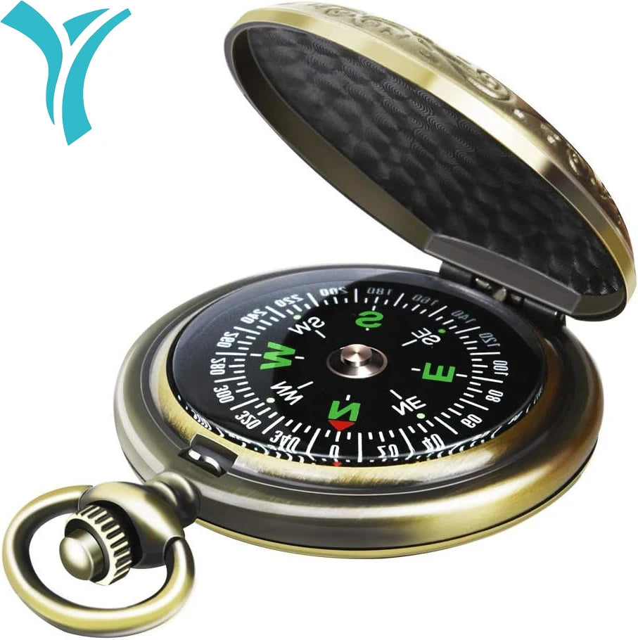 Vintage-style pocket compass with detailed design on a white background