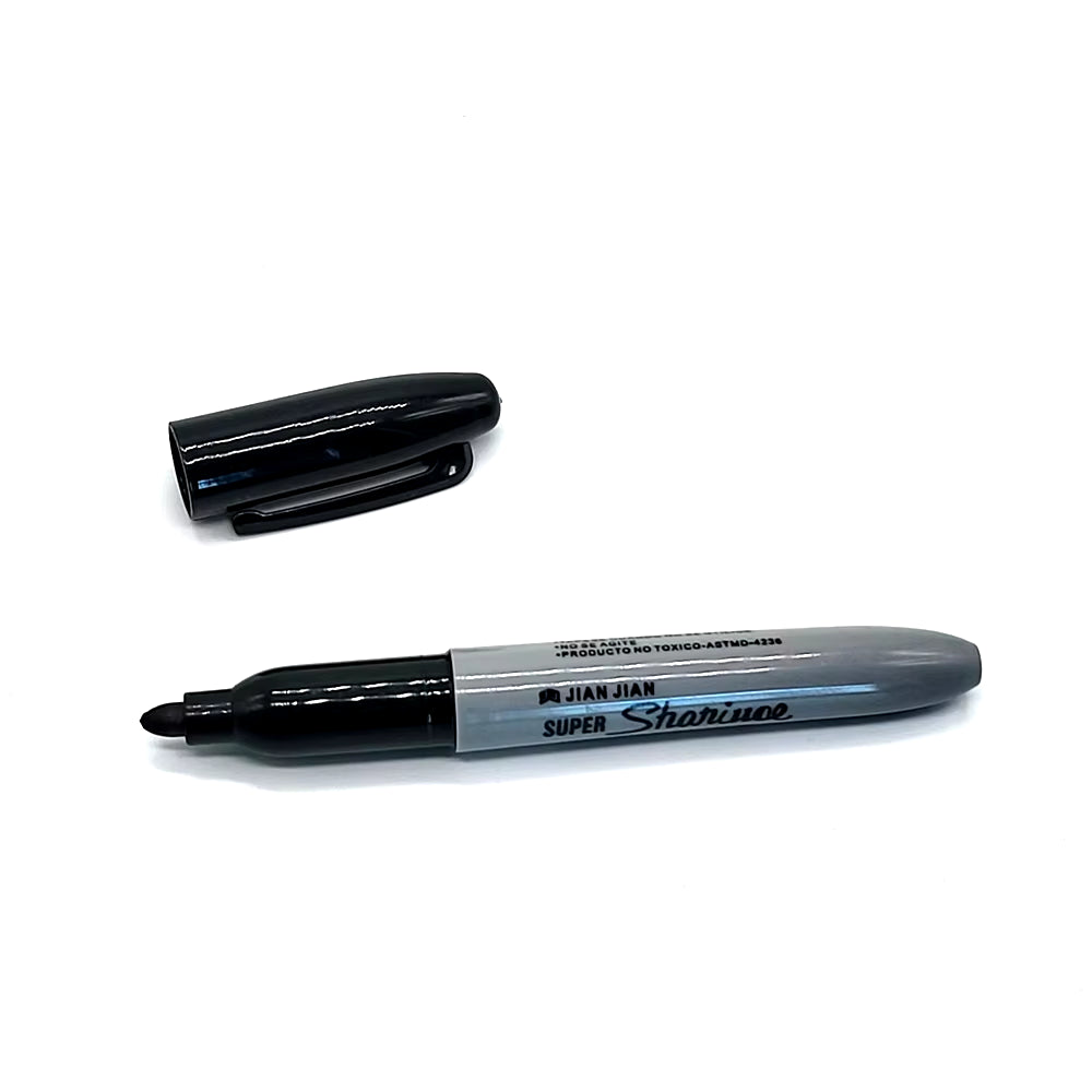 Hollowed out black permanent marker with screw off cap for storing valuables.