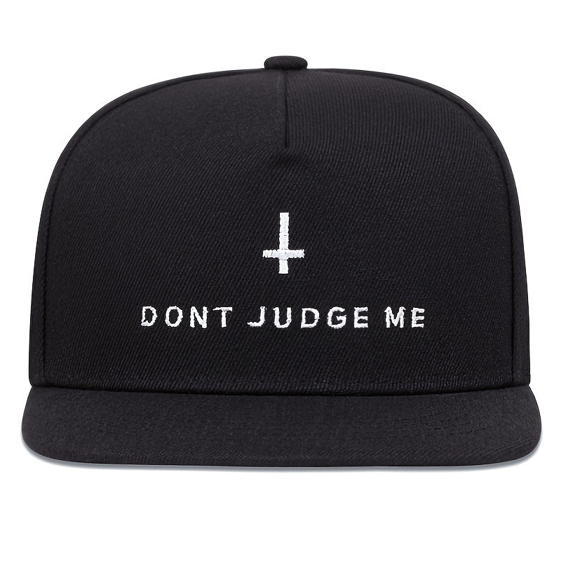 Black cap with 'DON'T JUDGE ME' text and cross symbol on a white background