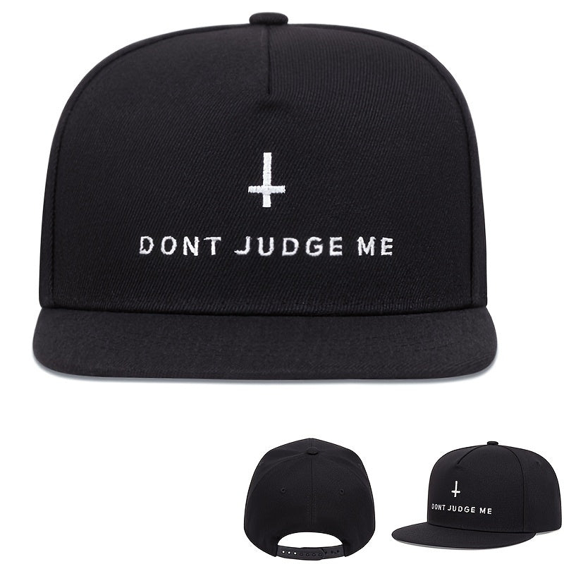 Black cap with 'DON'T JUDGE ME' text and cross symbol on a white background