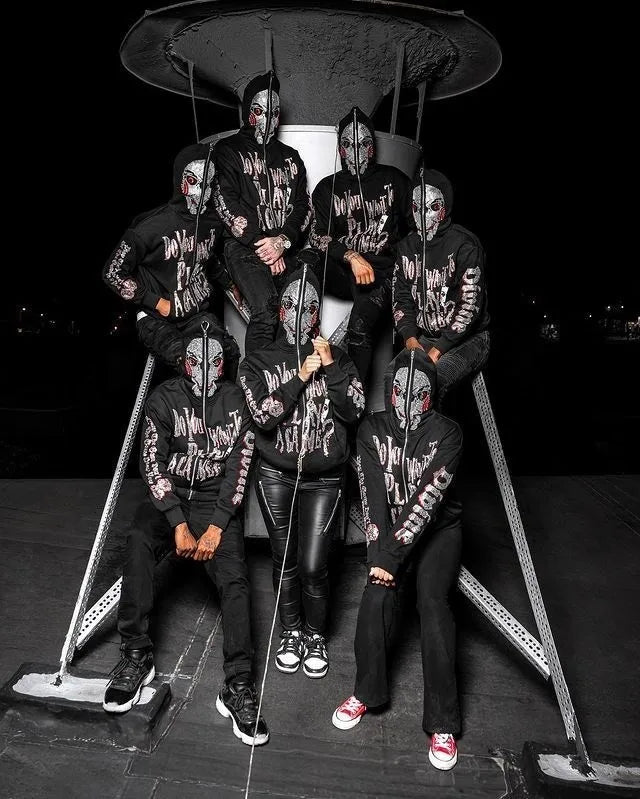 Jigsaw hoodie full-zip mask from Saw with rhinestone graphics and horror design and Back of hoodie with Game Over buzzsaw design from Saw movie franchise