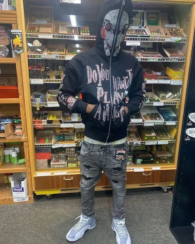 Jigsaw hoodie full-zip mask from Saw with rhinestone graphics and horror design and Back of hoodie with Game Over buzzsaw design from Saw movie franchise