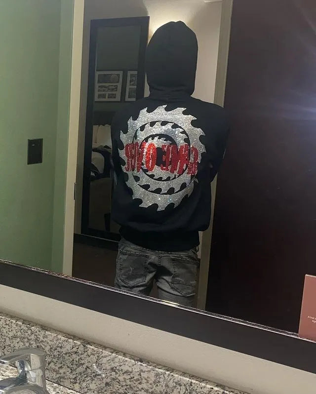 Jigsaw hoodie full-zip mask from Saw with rhinestone graphics and horror design and Back of hoodie with Game Over buzzsaw design from Saw movie franchise