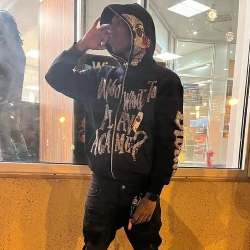 Jigsaw hoodie full-zip mask from Saw with rhinestone graphics and horror design and Back of hoodie with Game Over buzzsaw design from Saw movie franchise