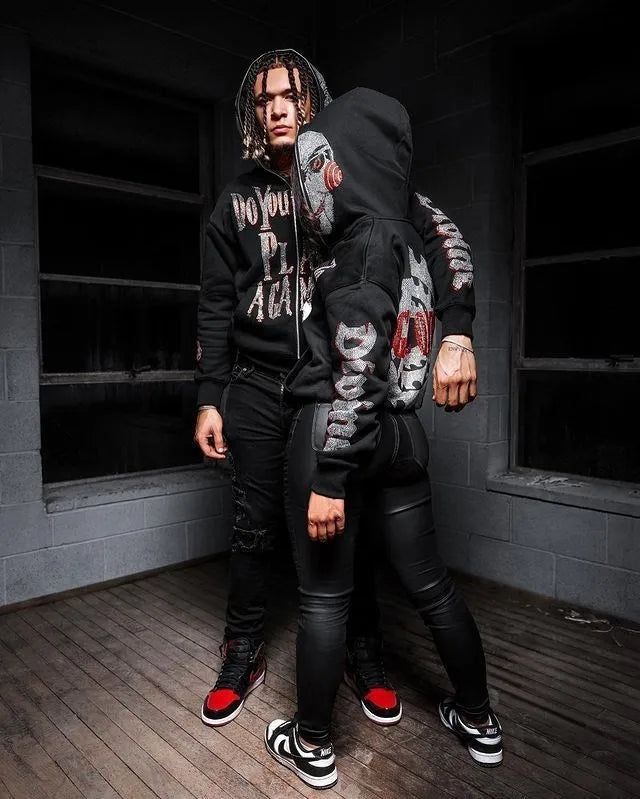 Jigsaw hoodie full-zip mask from Saw with rhinestone graphics and horror design and Back of hoodie with Game Over buzzsaw design from Saw movie franchise