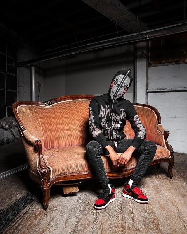 Jigsaw hoodie full-zip mask from Saw with rhinestone graphics and horror design and Back of hoodie with Game Over buzzsaw design from Saw movie franchise