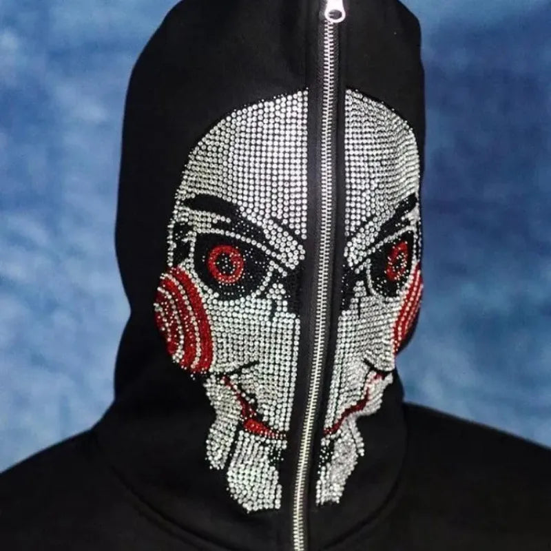Jigsaw hoodie full-zip mask from Saw with rhinestone graphics and horror design and Back of hoodie with Game Over buzzsaw design from Saw movie franchise