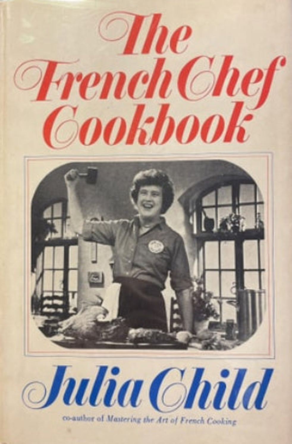 Book cover of 'The French Chef Cookbook' by Julia Child on a blue background