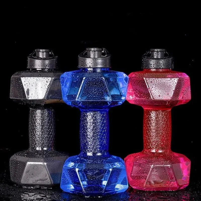 Three colorful dumbbell-shaped water bottles on a black background