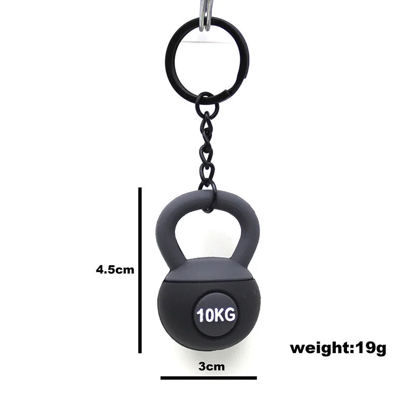 Black kettlebell keychain with measurement details on a white background