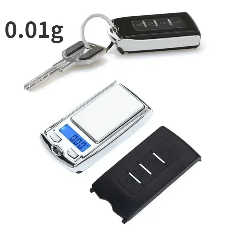Digital pocket scale with keychain attachment on a white background