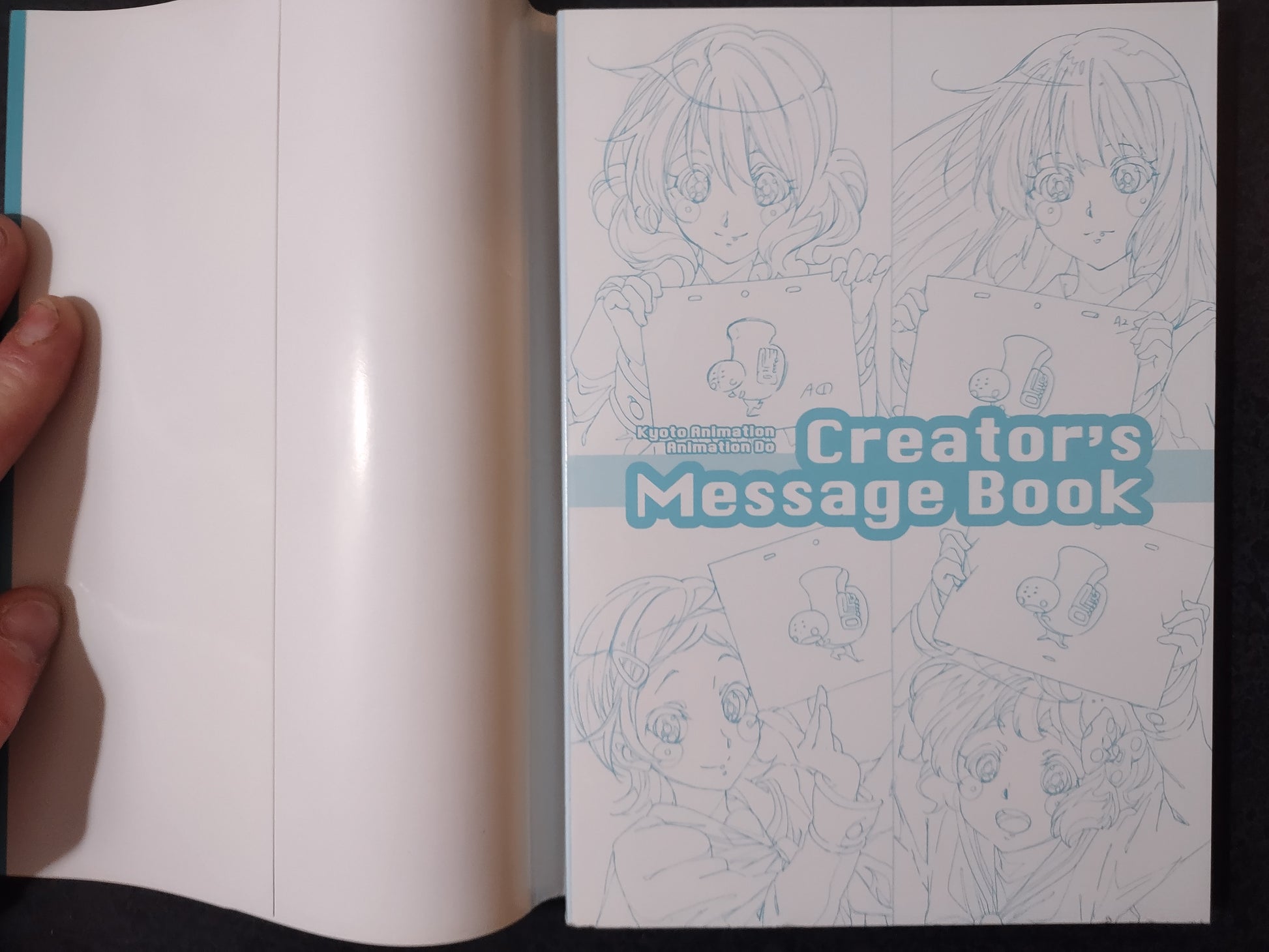 Open book with illustrations and 'Creator's Message Book' text