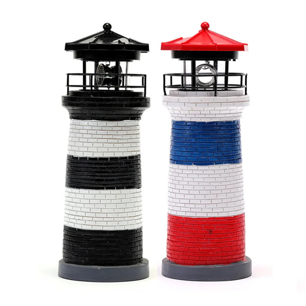 Two model lighthouses with black, white, and red stripes on a white background