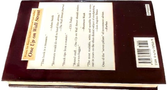 Flat, side view of 'Beating the Street' by Peter Lynch, hardcover book back cover.
