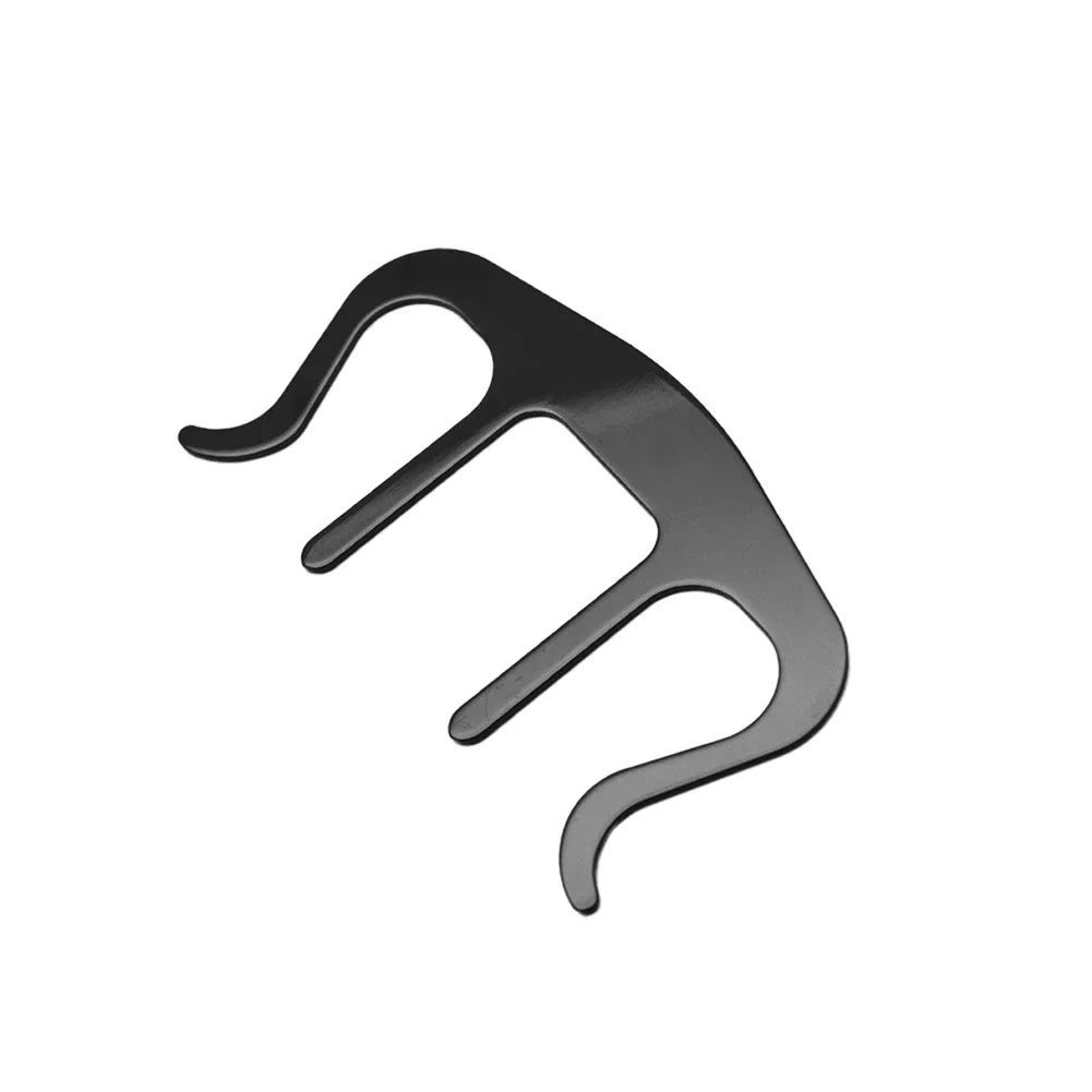 Black metal music book capo on a white background