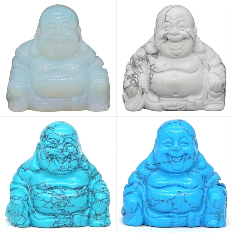 Four different colored Buddha statues on a white background