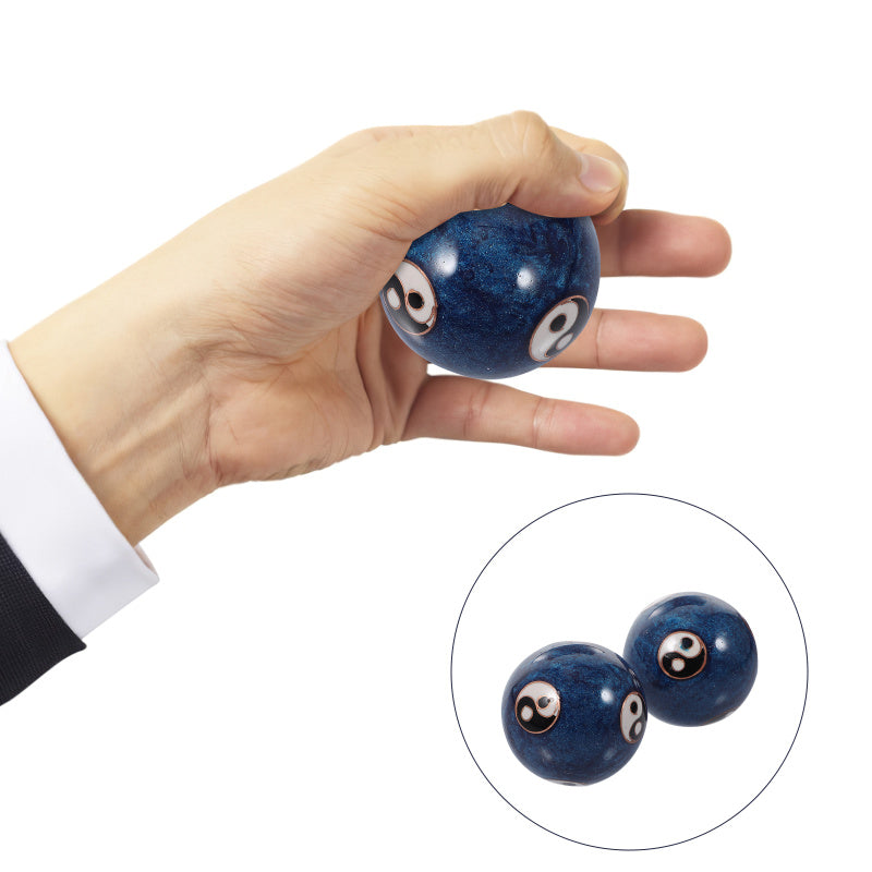 A hand holds a small blue baoding ball with white and black yin-yang details, and a circular inset showing two similar balls in a set on a white background.