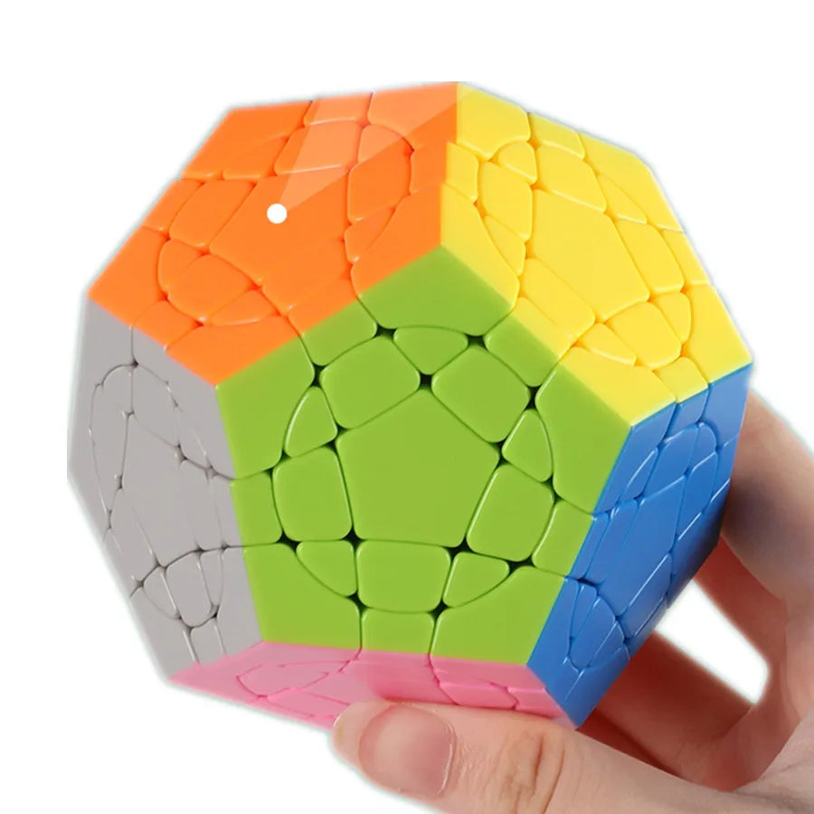 Colorful geometric puzzle held by a hand on a white background