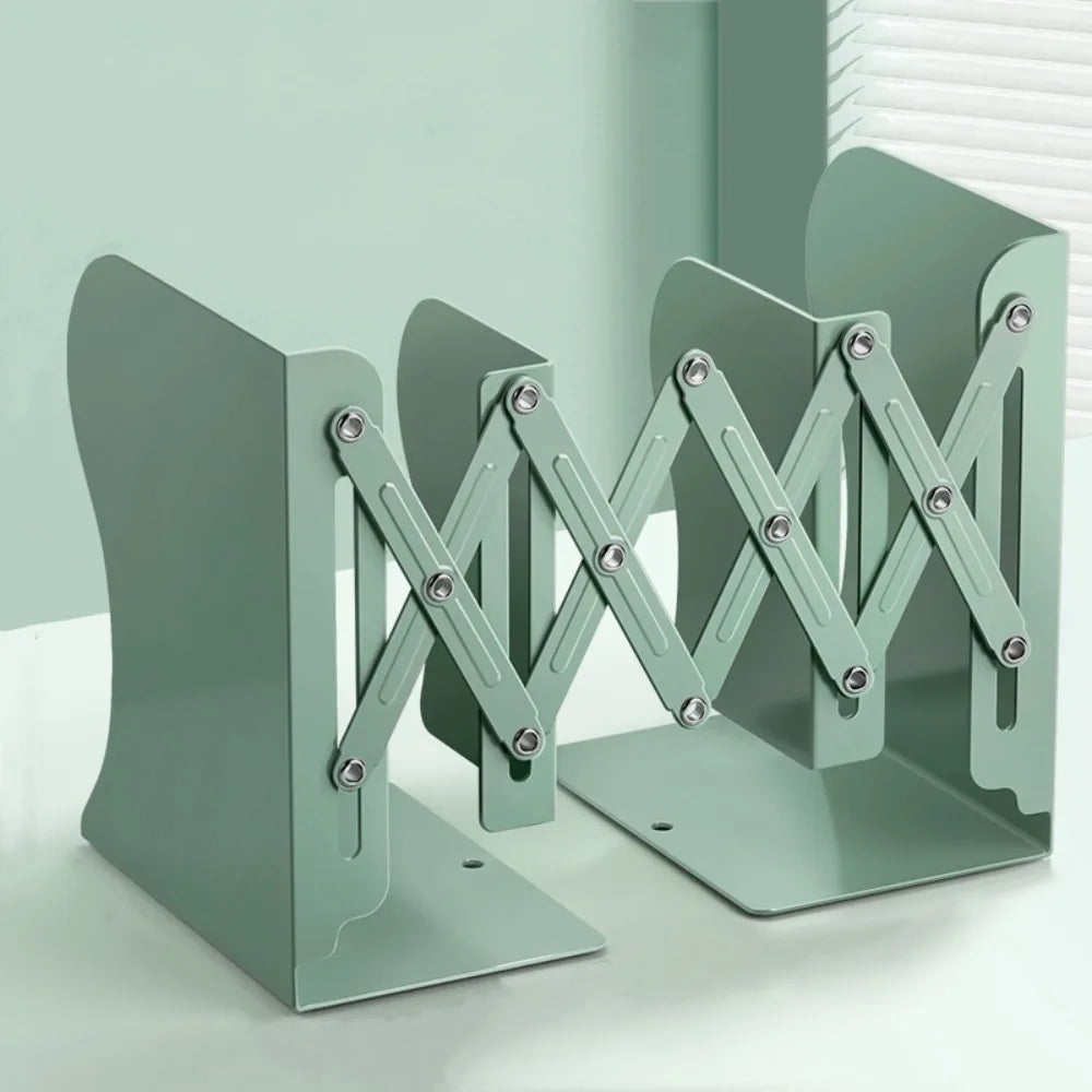 Pair of green metal bookends on a light gray background