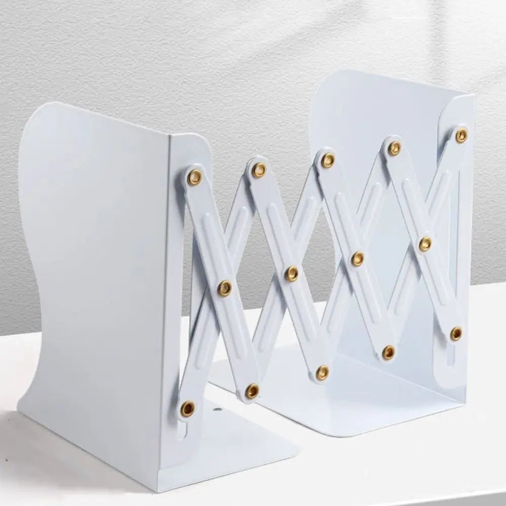 White bookends with gold accents on a light gray background